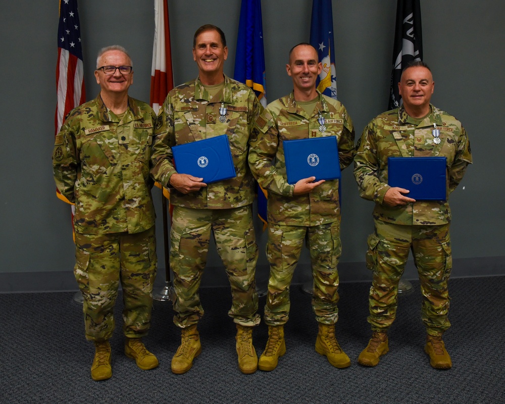 117 ARW Religious Affairs is presented with the Air and Space Achievement Medal