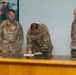 Maj. Gen Todd Hunt signs the Suicide Prevention Awareness Proclamation