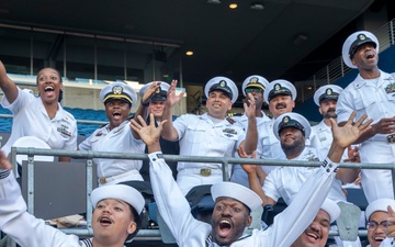 Sailors and Marines attend the Seattle Seahawks Fest
