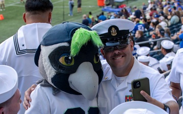 Sailors and Marines attend the Seattle Seahawks Fest