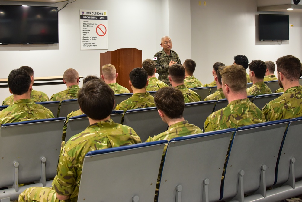 The New Zealand Defense Force arrives at Osan Air Force Base, South Korea.