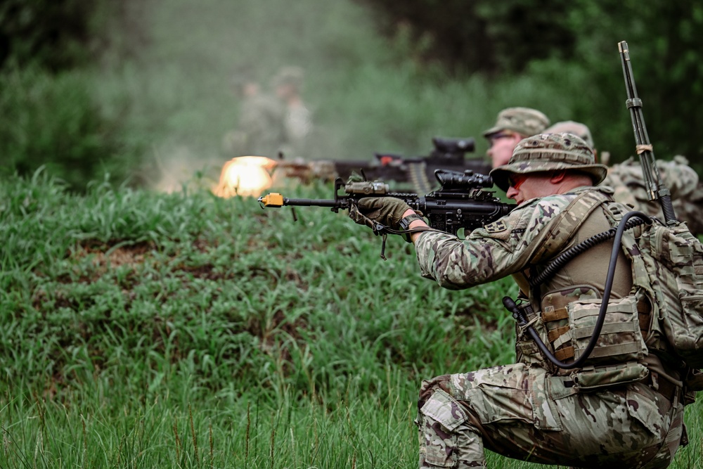 Soldiers with 2nd Battalion, 23rd Infantry Regiment engage targets during a squad live-fire exercise at the Story Live Fire Complex, South Korea, July 31, 2025.