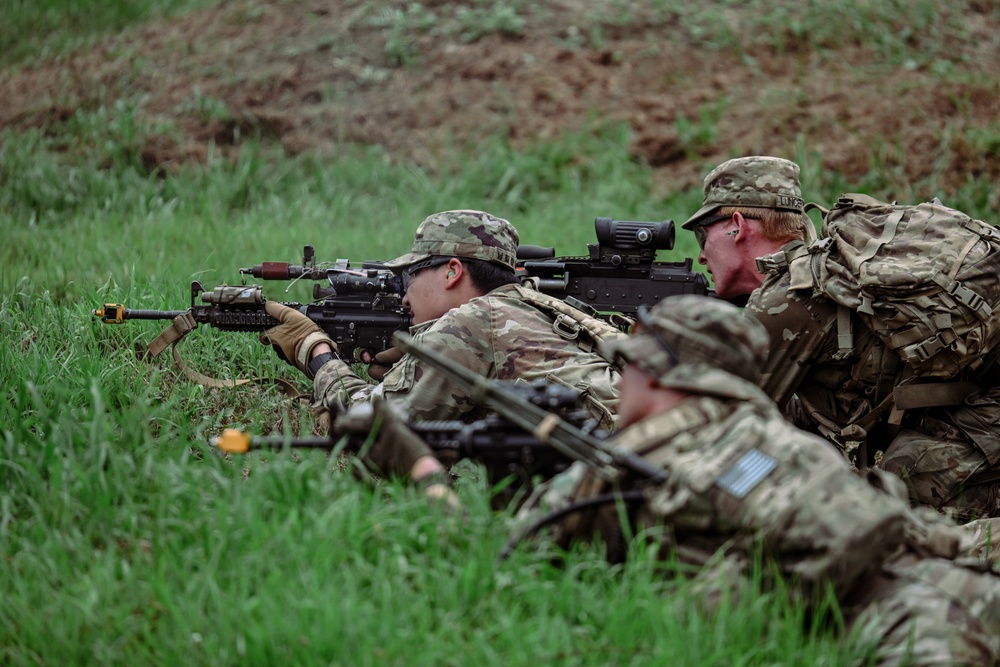 Soldiers from 2nd Battalion, 23rd Infantry Regiment fire from the prone during a squad live-fire training exercise at the Story Live Fire Complex, South Korea, July 31, 2025.
