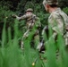 U.S. Soldiers assigned to 2nd Battalion, 23rd Infantry Regiment react to contact during a squad live-fire iteration at the Story Live Fire Complex, South Korea, July 31, 2025.