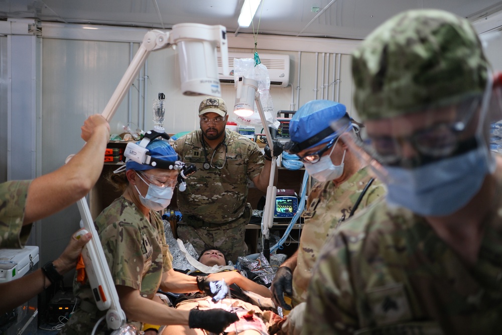 Soldiers perform simulated wartime surgery in mass casualty exercise