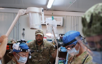 Soldiers perform simulated wartime surgery in mass casualty exercise