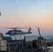 An MH-60R Sea Hawk helicopter lifts off from the USS Bulkeley flight deck