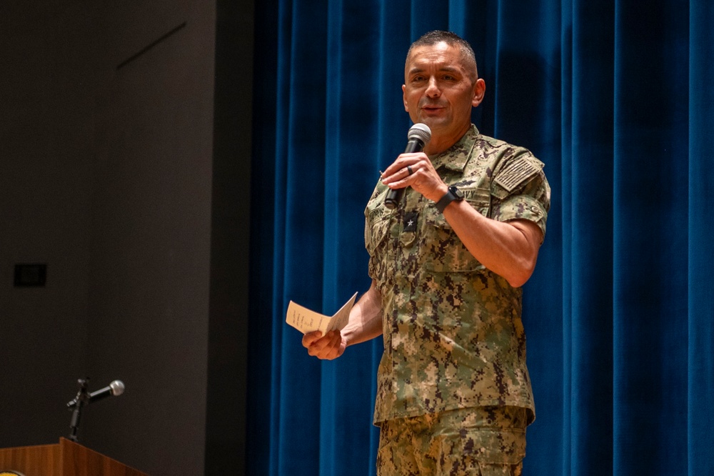 Rear Adm. Cuadros Addresses NAVFAC EURAFCENT Staff in Naples, Italy
