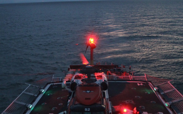 Coast Guard Cutter Escanaba and Air Station Elizabeth City crew members conduct helicopter-ship qualification training in the Chesapeake Bay