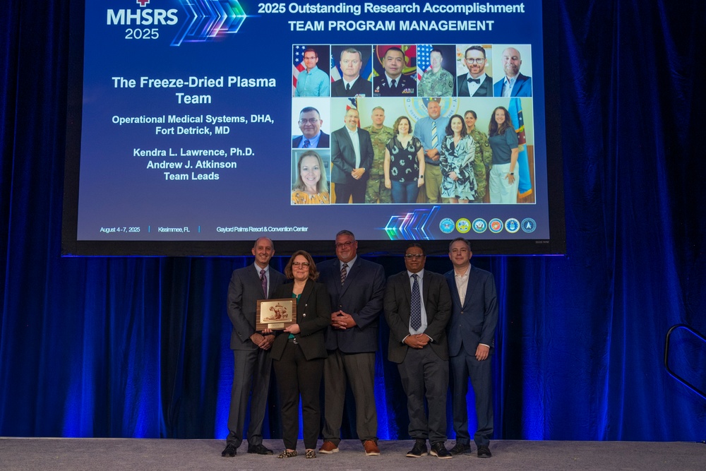 Operational Medical Systems team recognized for outstanding program management of key blood product during DOD health symposium in Florida