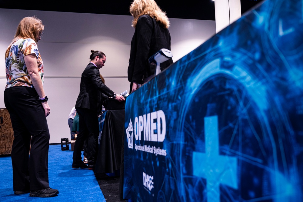 Operational Medical Systems team reaches DOD, industry audience during opening day of premier military health symposium