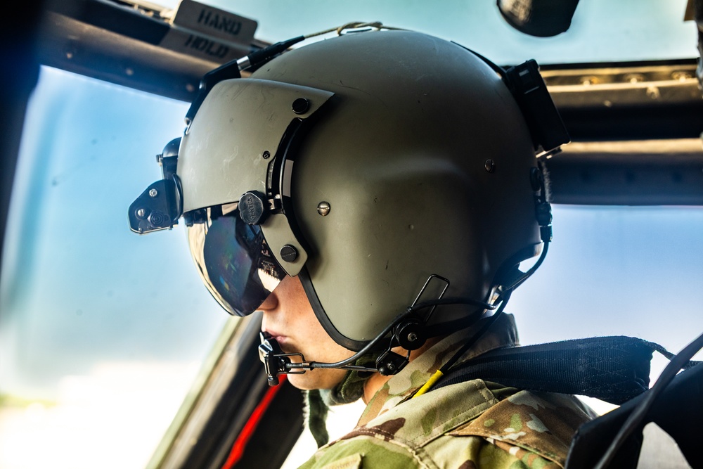 Pre-flight checks by a U.S. Army MH-60 Blackhawk crew