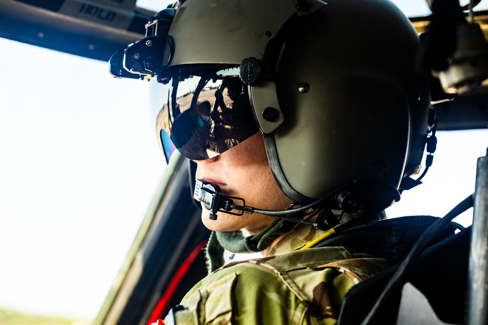 Pre-flight checks by a U.S. Army MH-60 Blackhawk crew