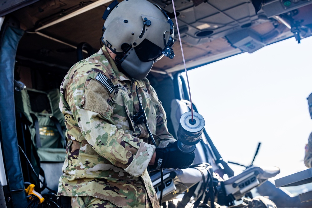 Pre-flight checks by a U.S. Army MH-60 Blackhawk crew
