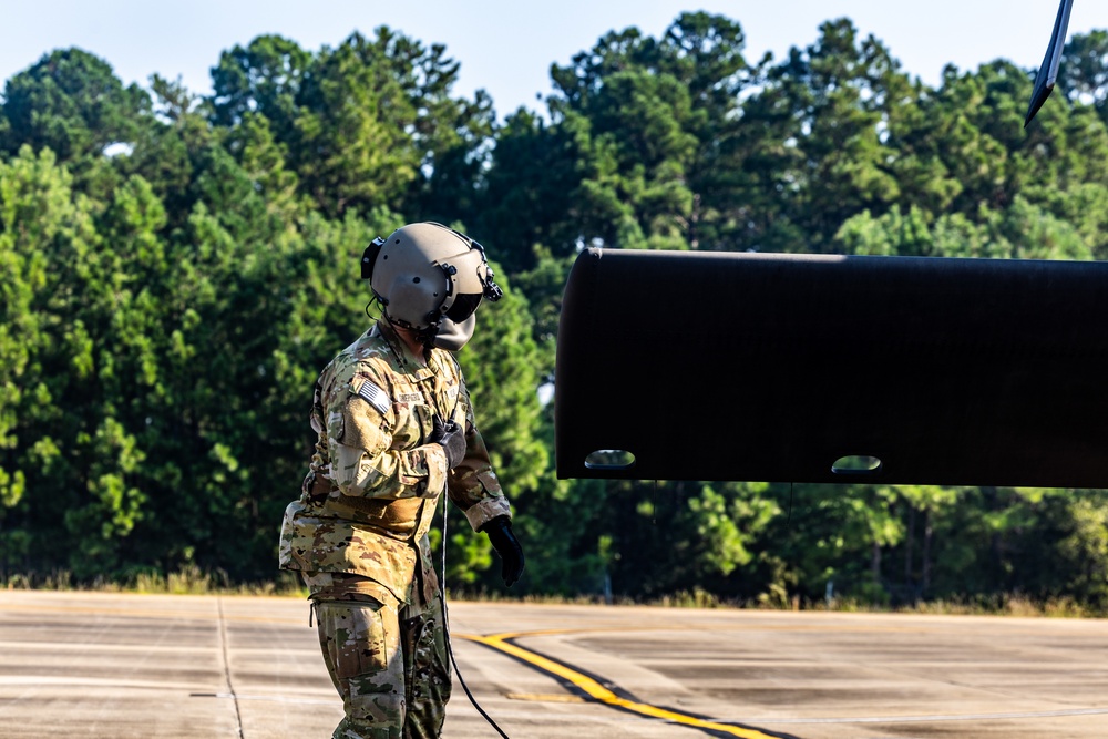 Pre-flight checks by a U.S. Army MH-60 Blackhawk crew