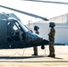 Pre-flight checks by a U.S. Army MH-60 Blackhawk crew