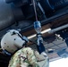 Pre-flight checks by a U.S. Army MH-60 Blackhawk crew
