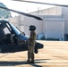 Pre-flight checks by a U.S. Army MH-60 Blackhawk crew
