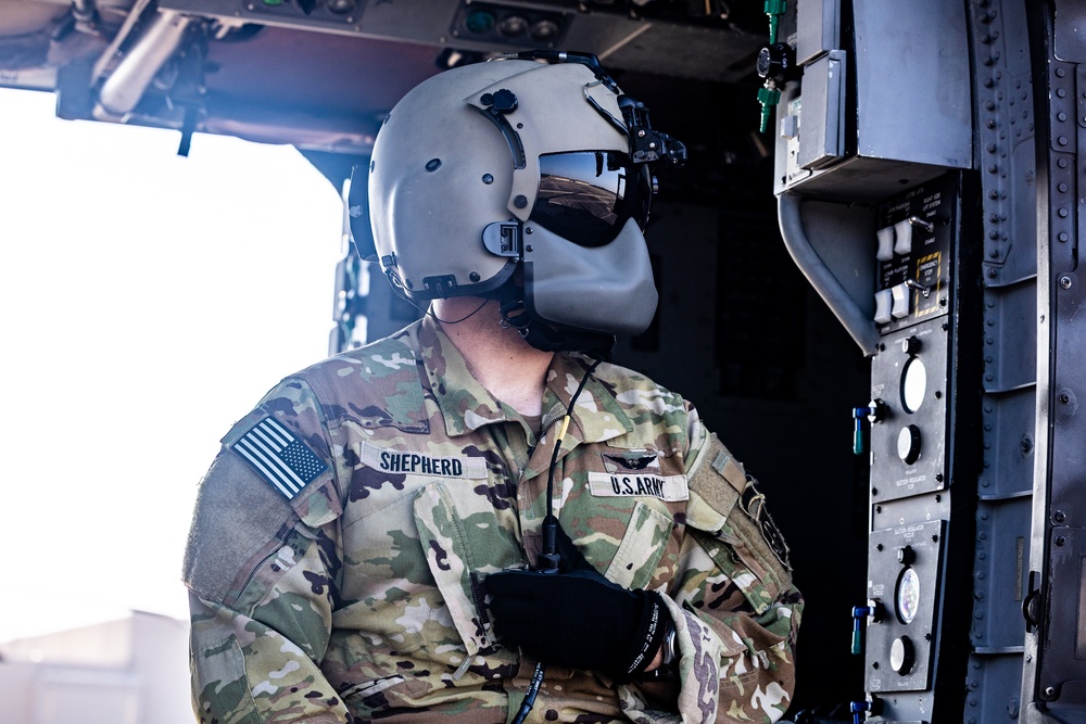 Pre-flight checks by a U.S. Army MH-60 Blackhawk crew