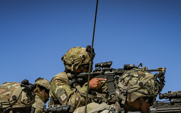 FLARNG Soldiers assess incoming vehicle at NTC