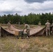 1st Armored Division sustainment Soldiers coordinate logistics for convoy protection
