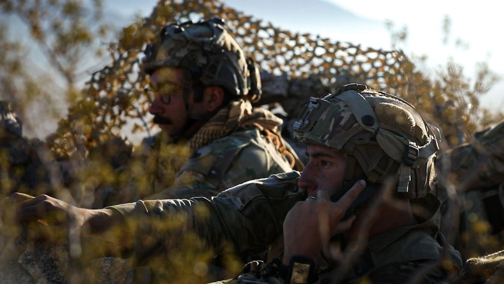 Virginia Army National Guard receive report of enemy vehicles at NTC