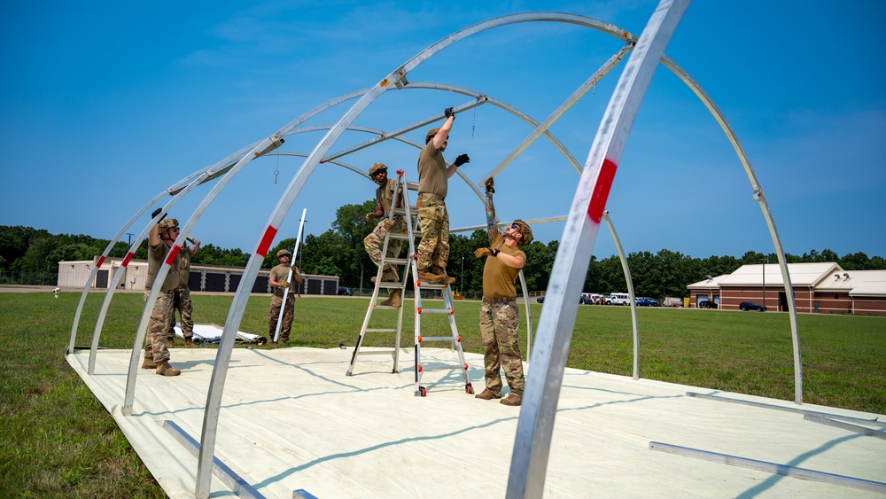 Airmen begin tent build-up during Exercise Northern Strike 25-2