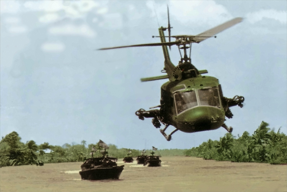 Upscale image of Seawolf HA(L)-3 Gunship UH-1E of HAL-3 escorting PBRs in Vietnam c1968