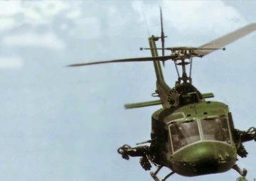 Upscale image of Seawolf HA(L)-3 Gunship UH-1E of HAL-3 escorting PBRs in Vietnam c1968