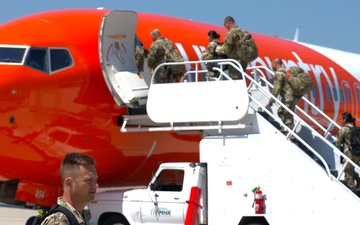 Kansas Guardsman Depart Home for Overseas Mobilization