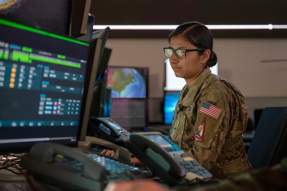 Combined Space Operations Center (CSpOC) staff monitor workstations.