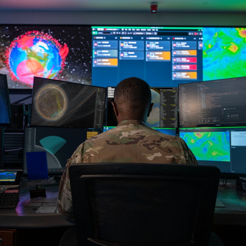 Combined Space Operations Center staff monitor workstations - photo 1 of 7