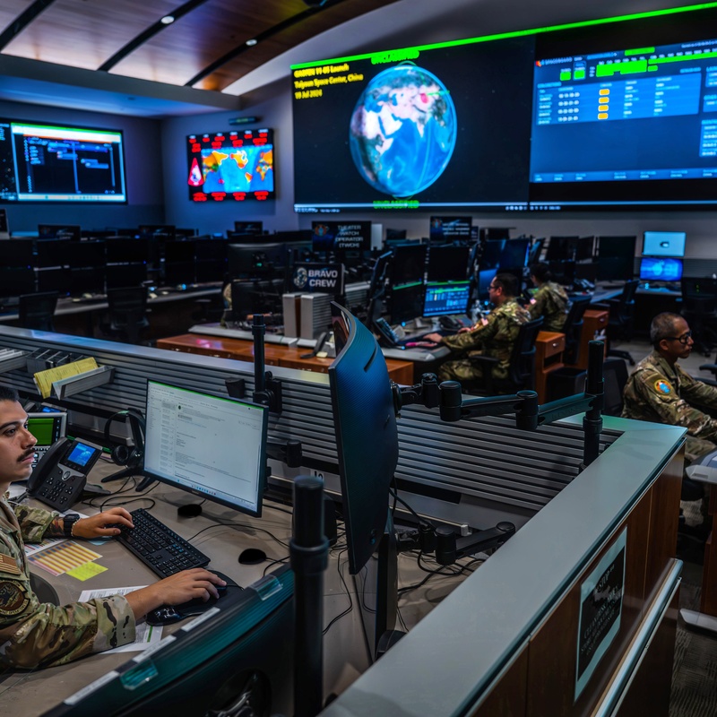 Combined Space Operations Center staff monitor workstations - photo 5 of 7