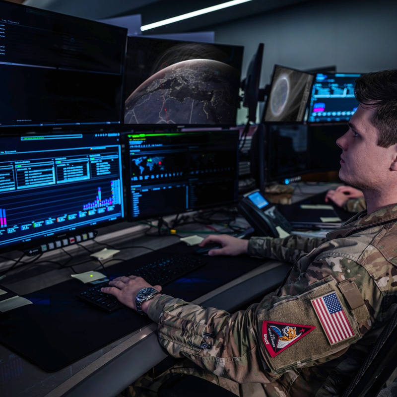 Combined Space Operations Center staff monitor workstations - photo 6 of 7