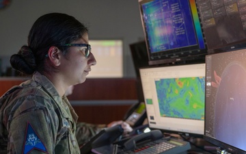 Combined Space Operations Center (CSpOC) staff monitor workstations.