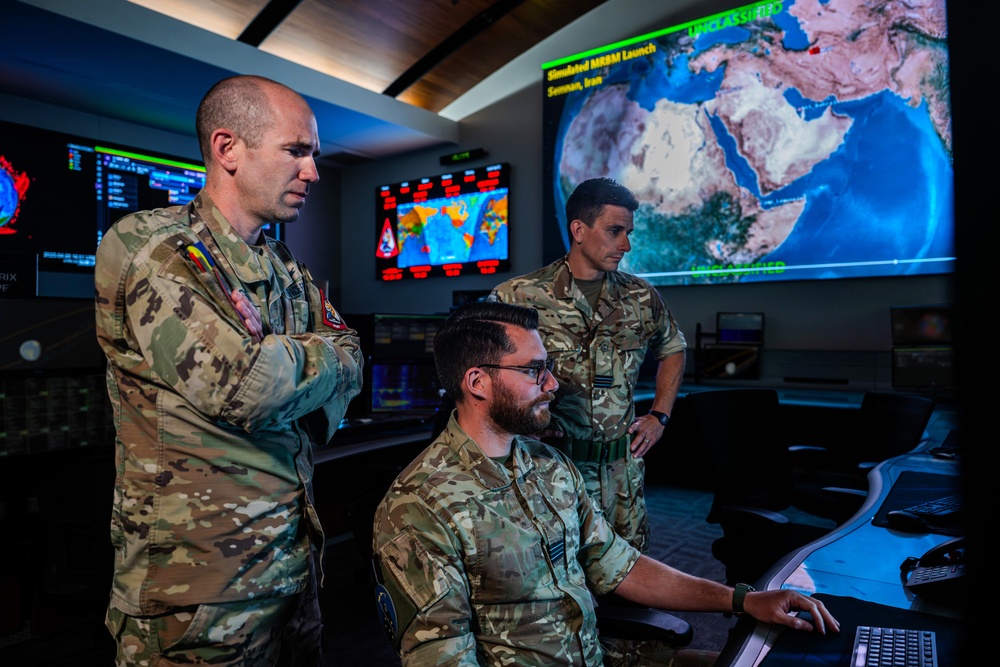 Combined Space Operations Center (CSpOC) staff monitor workstations.