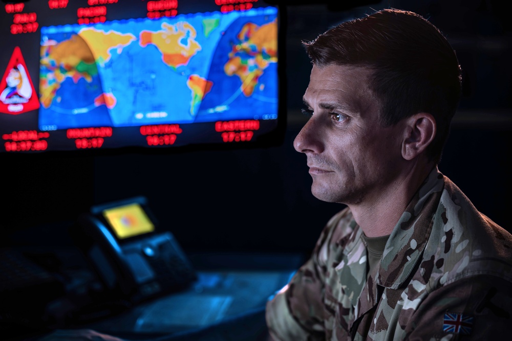 Combined Space Operations Center (CSpOC) staff monitor workstations.