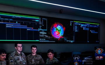 Combined Space Operations Center (CSpOC) staff monitor workstations.