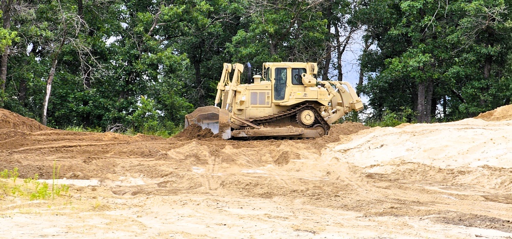 Engineer battalion Soldiers work on earth-moving troop project at Fort McCoy during July 2025 training