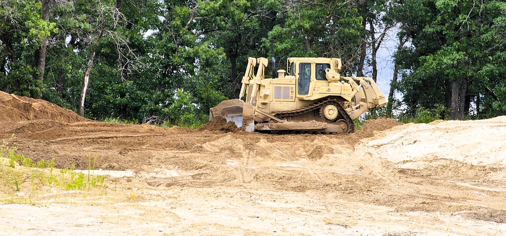 Engineer battalion Soldiers work on earth-moving troop project at Fort McCoy during July 2025 training