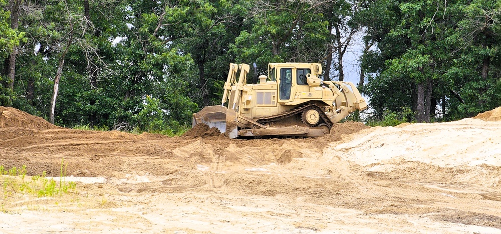 Engineer battalion Soldiers work on earth-moving troop project at Fort McCoy during July 2025 training