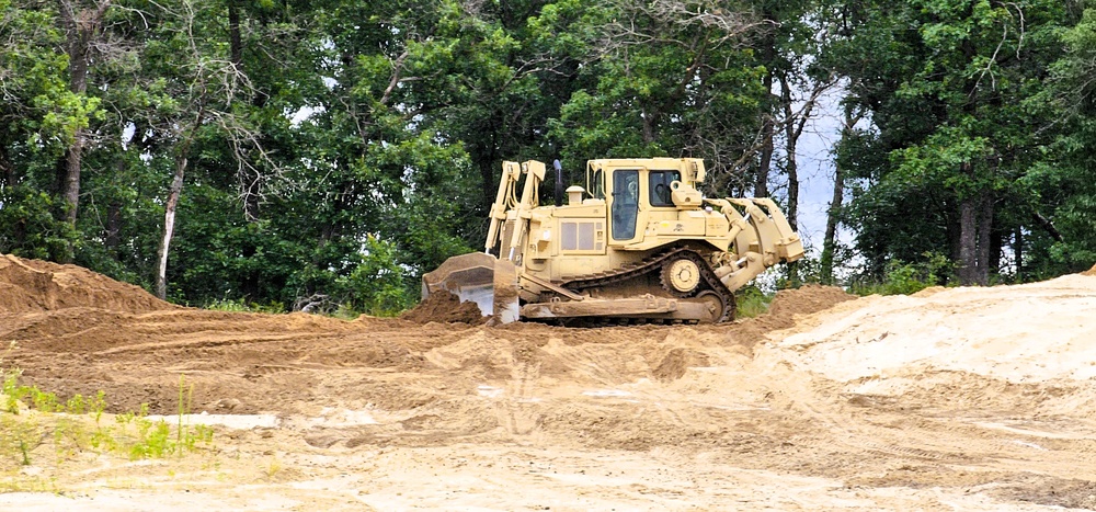 Engineer battalion Soldiers work on earth-moving troop project at Fort McCoy during July 2025 training