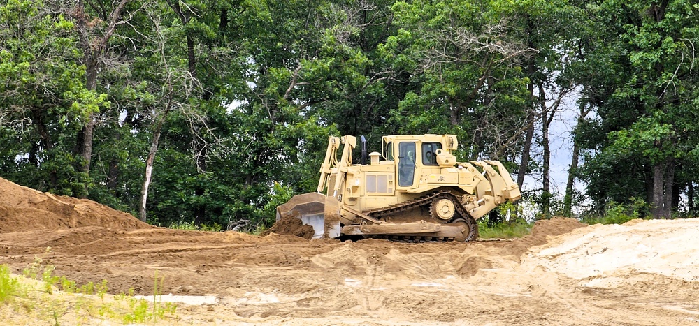 Engineer battalion Soldiers work on earth-moving troop project at Fort McCoy during July 2025 training