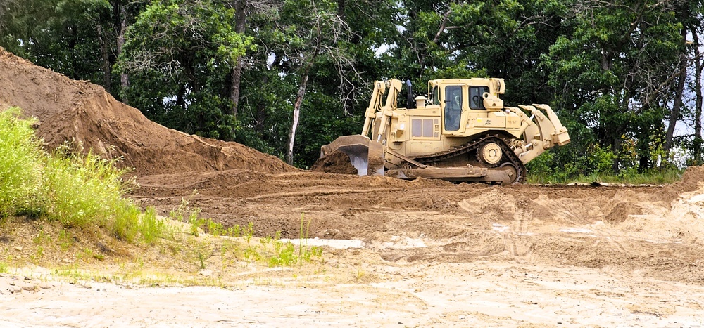 Engineer battalion Soldiers work on earth-moving troop project at Fort McCoy during July 2025 training