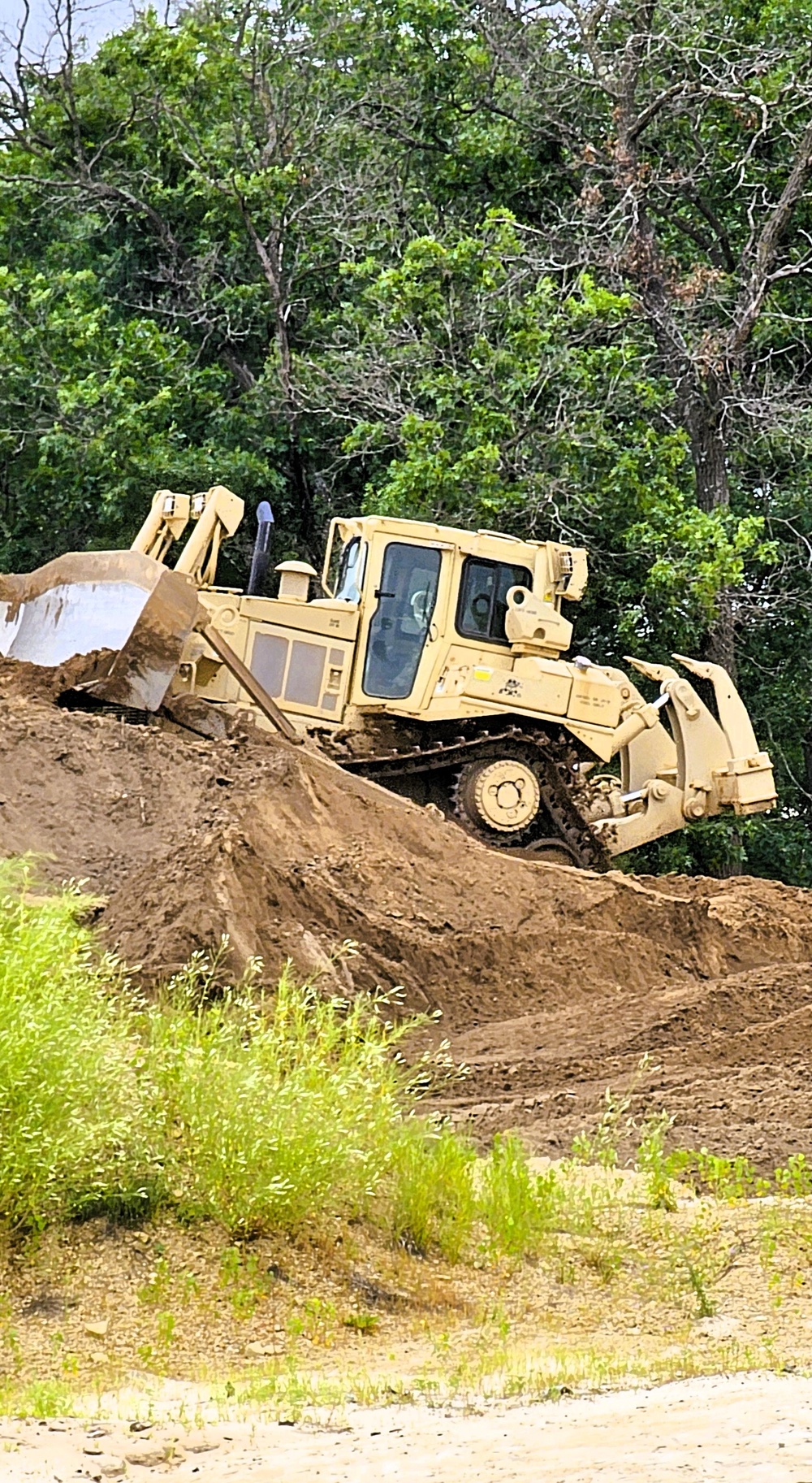 Engineer battalion Soldiers work on earth-moving troop project at Fort McCoy during July 2025 training