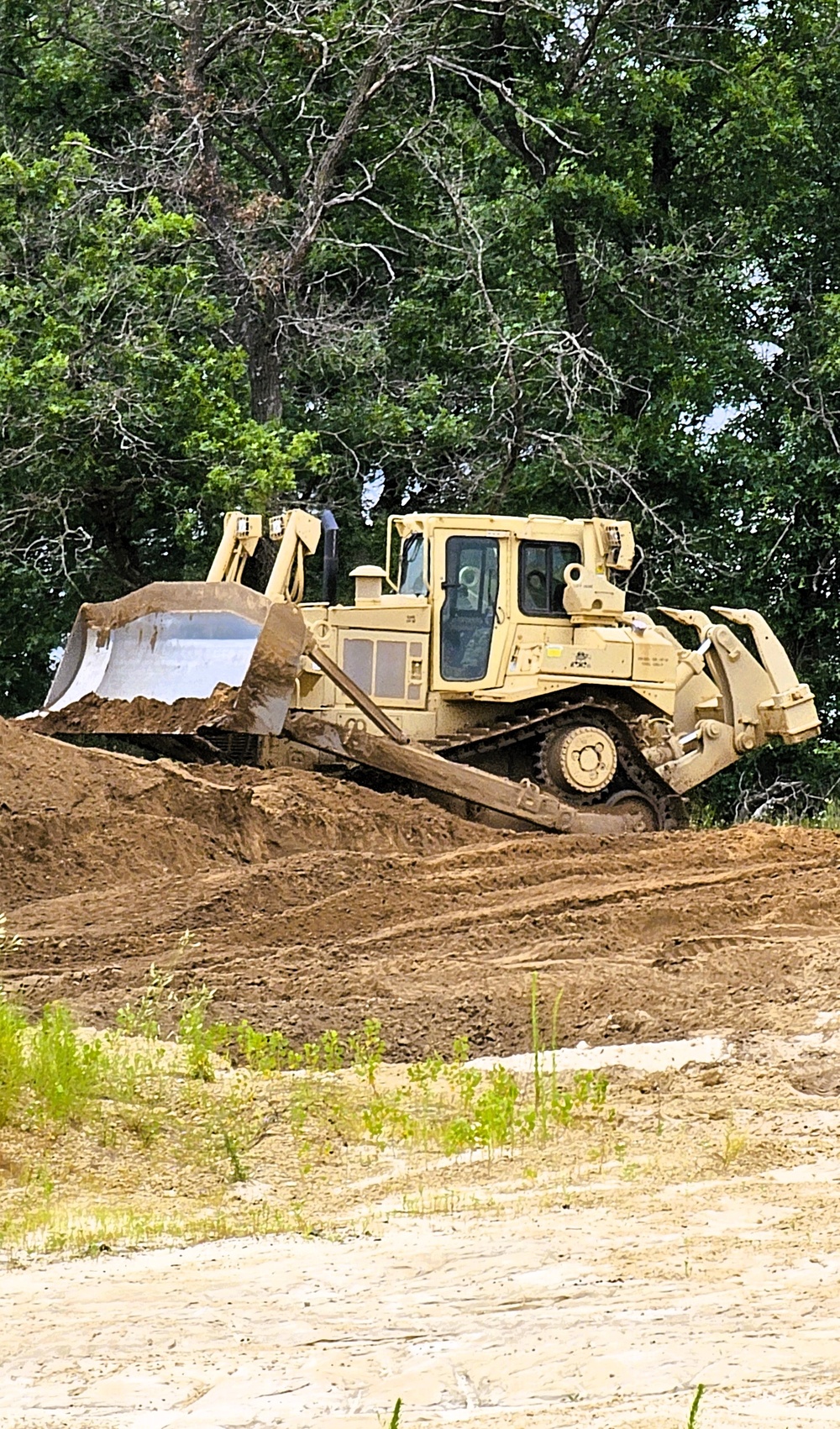 Engineer battalion Soldiers work on earth-moving troop project at Fort McCoy during July 2025 training
