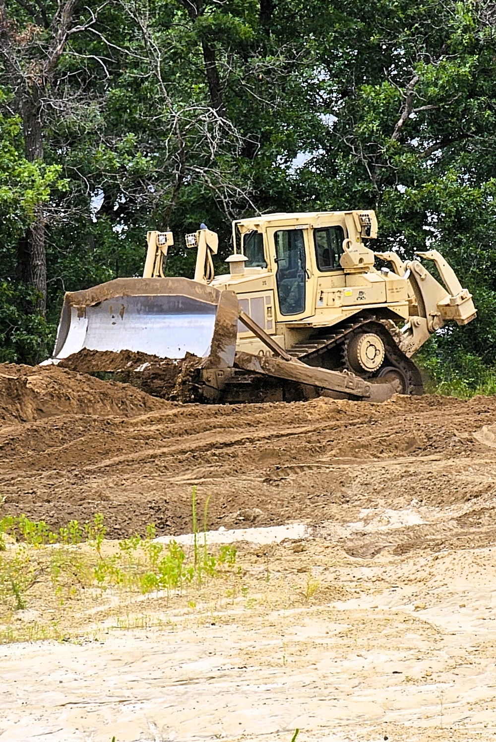 Engineer battalion Soldiers work on earth-moving troop project at Fort McCoy during July 2025 training