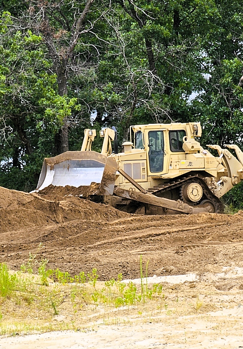 Engineer battalion Soldiers work on earth-moving troop project at Fort McCoy during July 2025 training