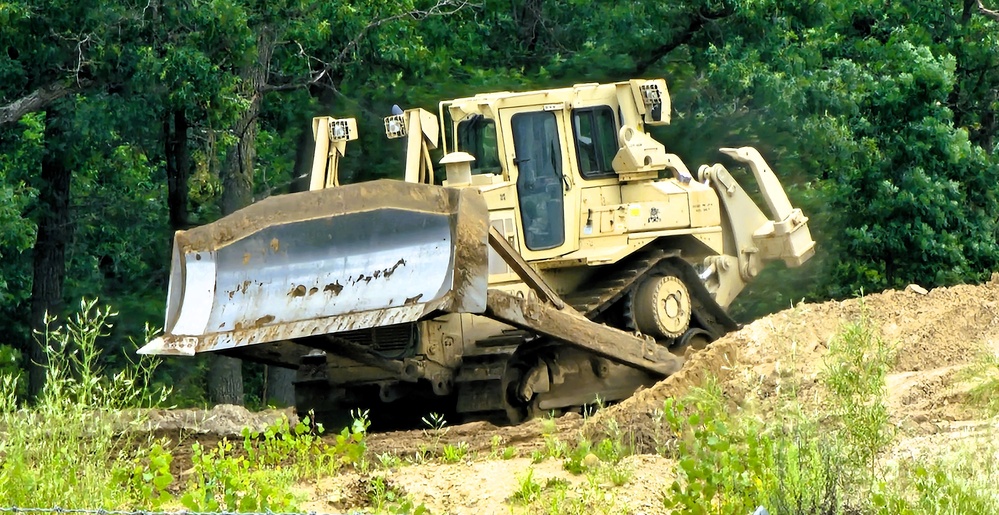Engineer battalion Soldiers work on earth-moving troop project at Fort McCoy during July 2025 training