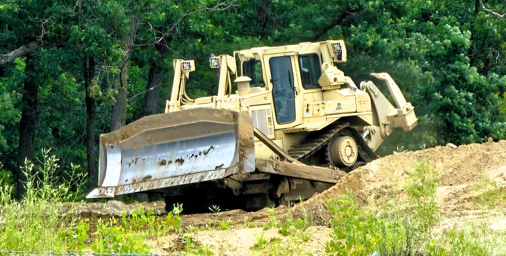 Engineer battalion Soldiers work on earth-moving troop project at Fort McCoy during July 2025 training